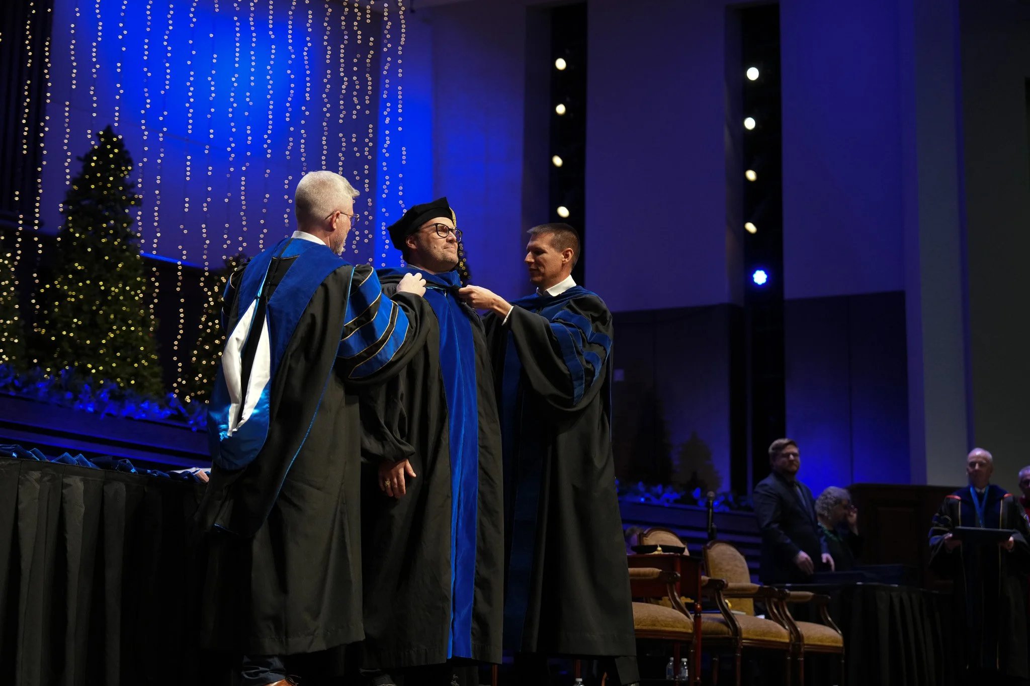 Graduate receiving stole at ceremony