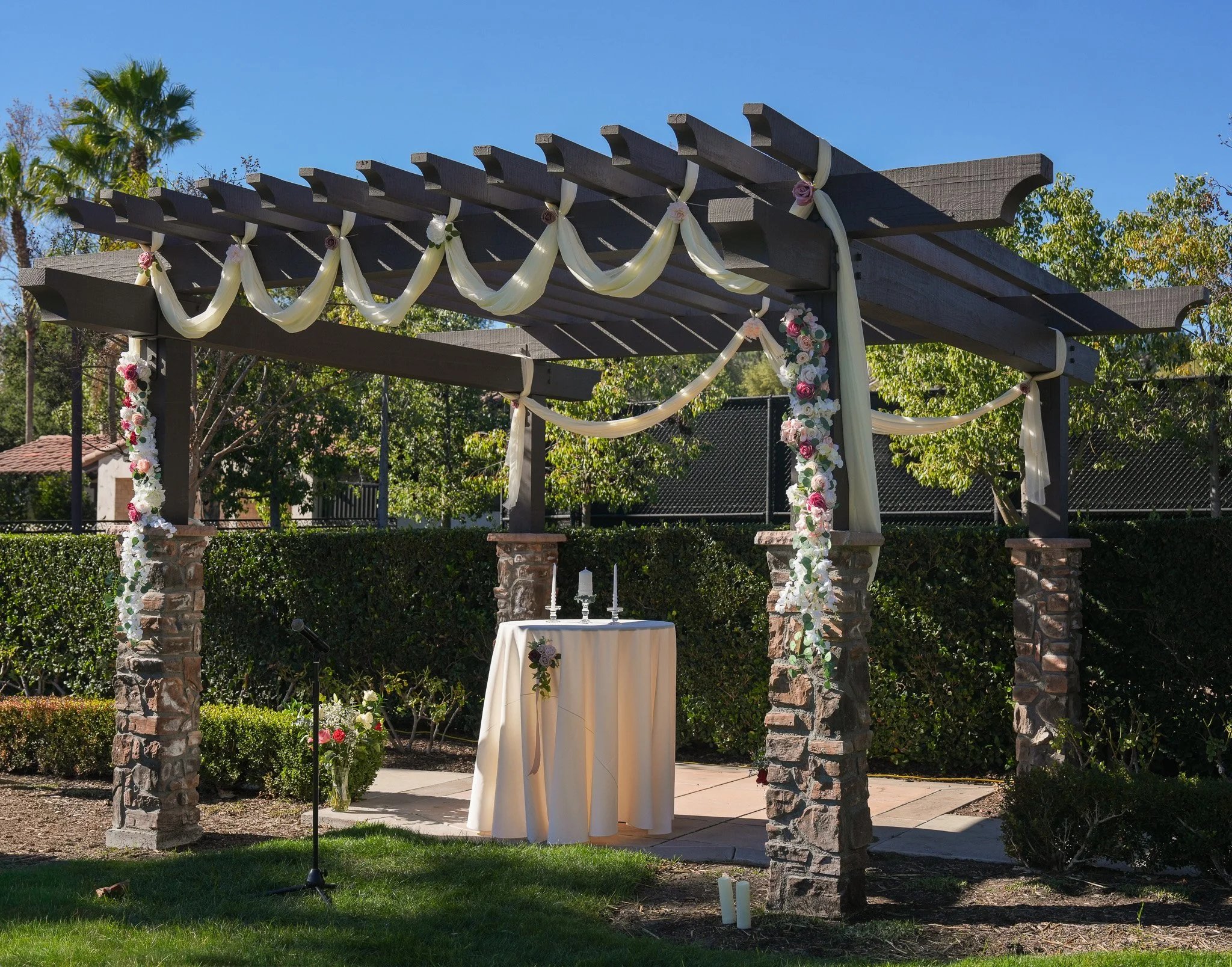 Decorated pergola with floral arrangements